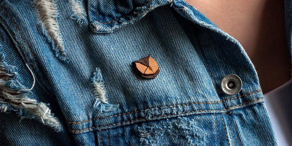 A woman in jeans jacket with the wooden brooch Owl Brooch A woman in jeans jacket with the wooden brooch Owl Brooch